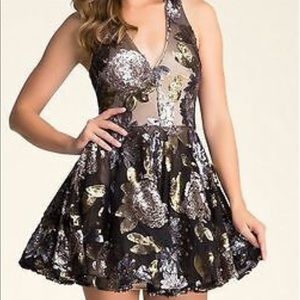 Bebe black and gold mini dress